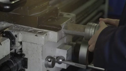 Hand turning gears Stock Footage 151490573