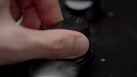 Hand Turning on kitchen stove Close up Stock Footage 166086192