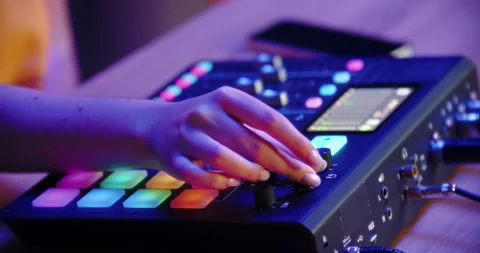 Hand turning knob on audio control panel Stock Footage 315518053