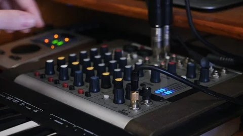 Hand turning knobs and pushing buttons on music sound mixing board at home 스톡 동영상 111926389