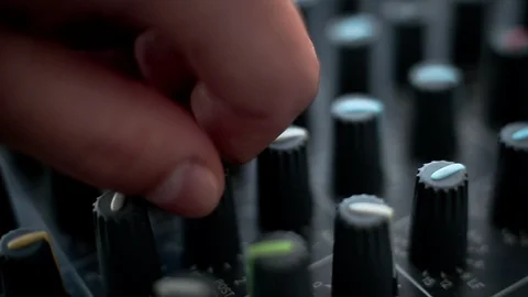 Hand turning knobs on a Dj controller, sound studio equipment 스톡 동영상 89776445