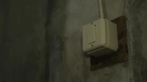 Hand Turning On Light Switch 動画素材 345660616