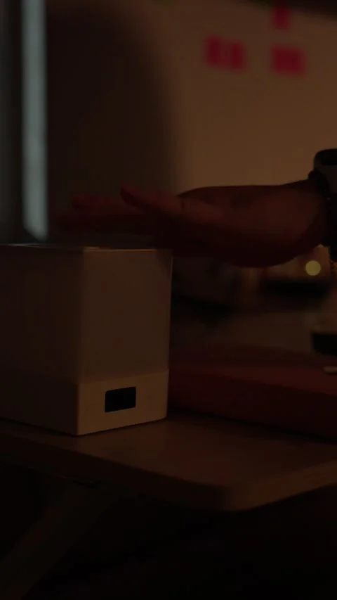 Hand Turning On Touch Bedside Lamp with Digital Clock Stock Footage 344948078