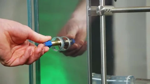 Hand turning a valve closeup Stock Footage 69166662