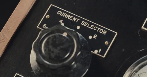 Hand turning a vintage selector Stock Footage 74068420
