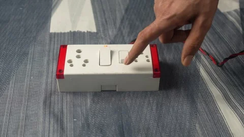 Hand Turning On Wall Switch Stock Footage 339563861