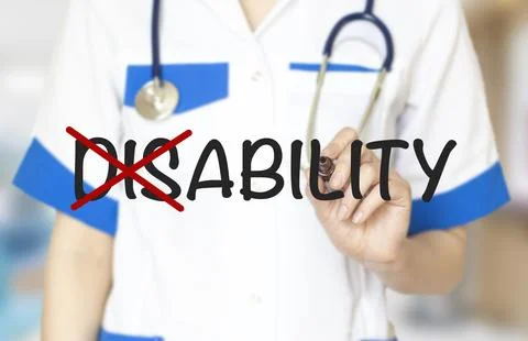 Hand turning the word Disability into Ability with marker Stock Photos