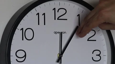Hand Turns Clock Pointer five Minutes Back Stock Footage 147771597