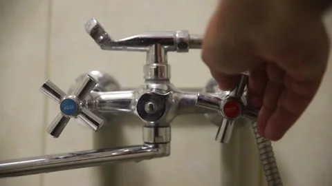 Hand Turns off  Faucet Stock Footage 290228327
