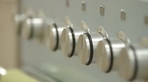 Hand turns hob on Stock Footage 22227307