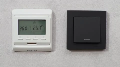 Hand turns off the switch. Stock Footage 194589323