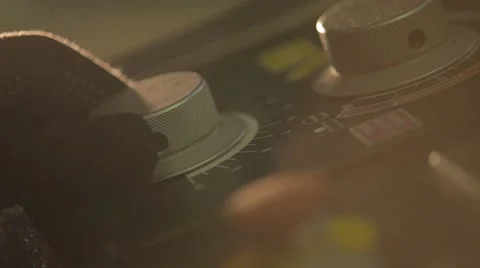 Hand turns the switch on the remote Video stock 68013264