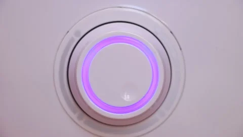 The hand turns the toggle switch on the device. Stock Footage 149840761