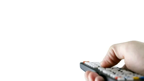 Hand with tv remote control isolated on white background 스톡 동영상 120940076