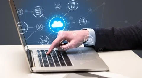Hand typing with cloud technology system concept Stock Photos