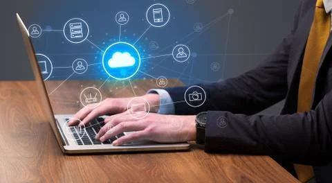 Hand typing with cloud technology system concept Stock Photos