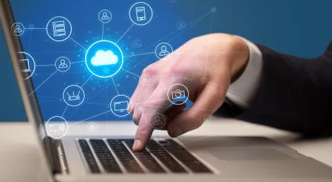 Hand typing with cloud technology system concept Stock Photos