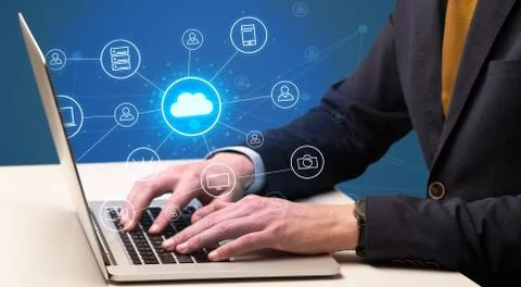 Hand typing with cloud technology system concept Stock Photos