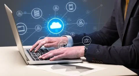 Hand typing with cloud technology system concept Stock Photos