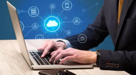 Hand typing with cloud technology system concept Stock Photos