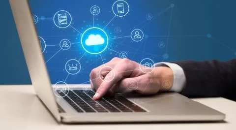 Hand typing with cloud technology system concept Stock Photos