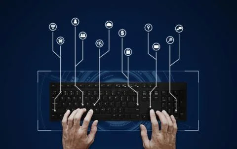 Hand typing on computer keyboard with application programming interface icons 스톡 사진