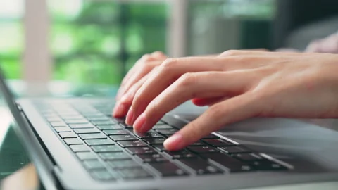 Hand typing on the computer keyboard on wooden desk. 스톡 동영상 168341284