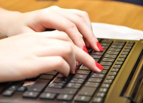 Hand typing on the computer. Stock Photos