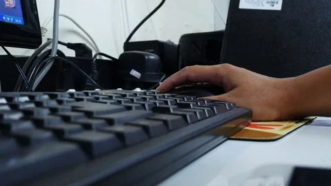 Hand typing on keyboard Stock Footage 79553174