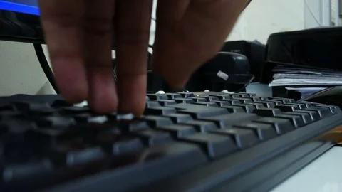 Hand typing on keyboard Stock Footage 79554415