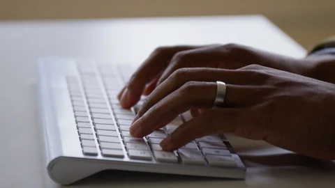 Hand typing on keyboard in office Stock Footage 93525892