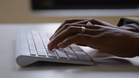 Hand typing on keyboard in office Stock Footage 93526038