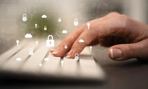 Hand typing on keyboard with secured concept around Foto stock