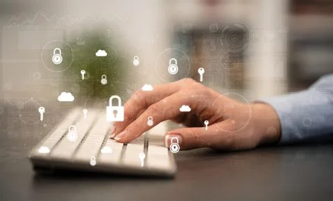 Hand typing on keyboard with secured concept around 스톡 사진