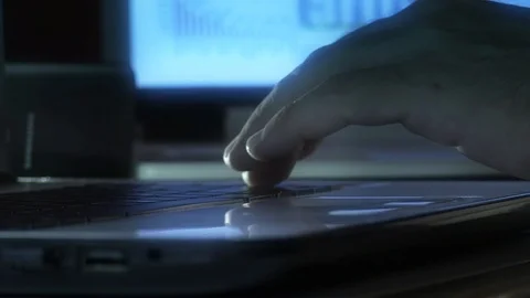 Hand typing on a laptop Stock Footage 90732943