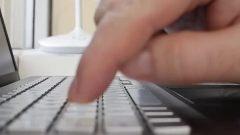 Hand Typing on Laptop Keyboard Closeup Detail Stock Footage 340034769