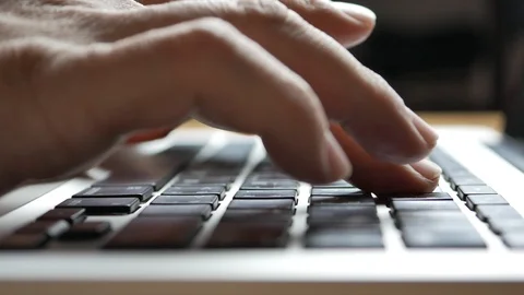 Hand typing on laptop keyboard Stock Footage 104361904