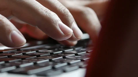 Hand typing on laptop keyboard Stock Footage 104361945