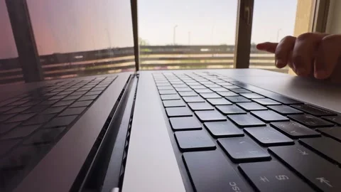 Hand Typing On Laptop Keyboard At Sunset Stock Footage 336643473