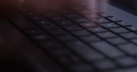 Hand typing on laptop PC computer keyboard in office Stock Footage 54136694