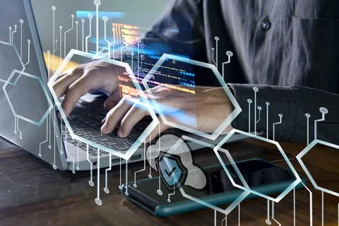 Hand typing on notebook keyboard Stock Photos