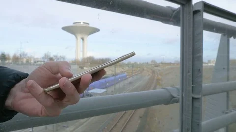 Hand typing sms mms on a smartphone Stock Footage 82323523