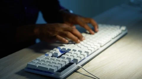 Hand typing on a white computer keyboard, Close-up of a white computer keyb.. Vídeo Stock 346462834