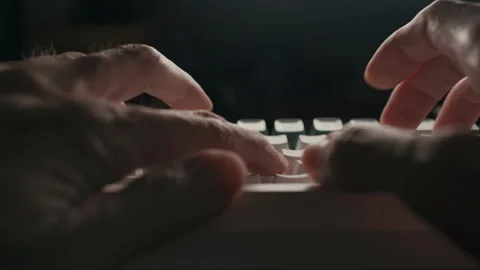 Hand Typing on White High-Profile Keyboard with Black Copy Space Stock Footage 330319601