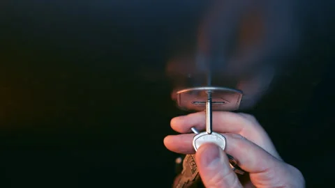 Hand Unlocking Metal Door with Key Close-Up | Person Opening Lock Top-Down View Stock Footage 344616134