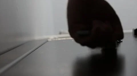 Hand unlocking a safe Stock Footage 47045225