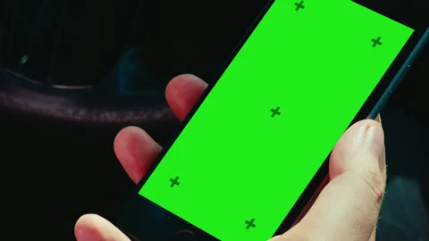 Hand Unlocking Smartphone Green Screen in Car Close Up Stock Footage 245347254