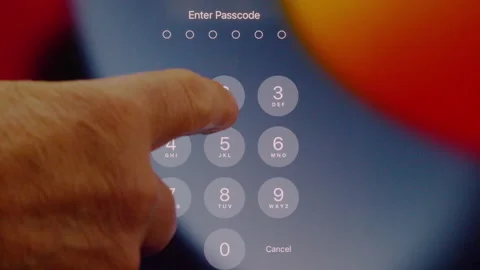 Hand unlocking a touch screen tablet computer. Stock Footage 221253330