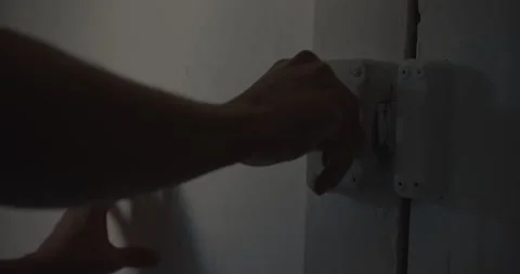 Hand Unlocks Door Inside The Room By Turning The Knob. close up Stockbeeldmateriaal 185521482