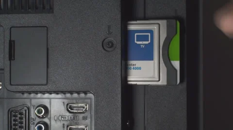 Hand Unplugging Network Card From A HDTV Point Of View,Television, Cables Stock Footage 37331861